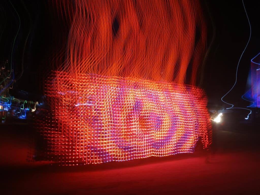 Long exposure — fire spiral patterns on the LED skin