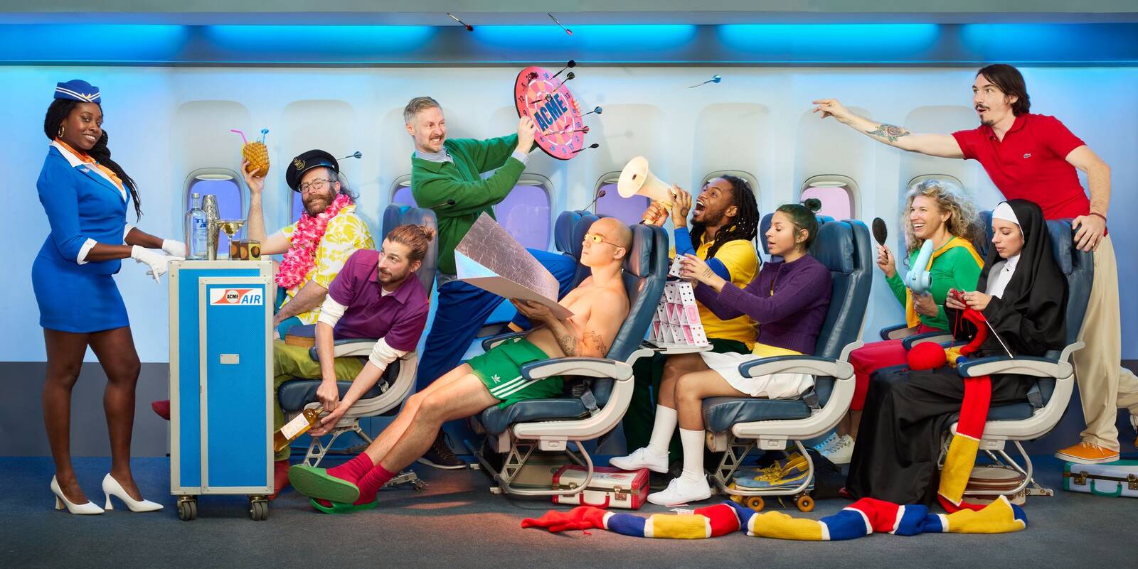 Acme Air — full cabin scene with passengers and flight attendants