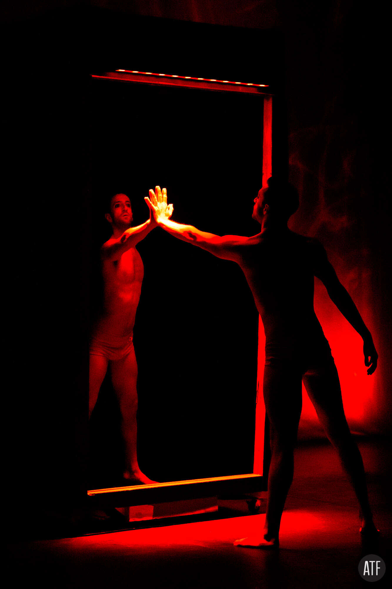 Mirror booth — red two-way mirror