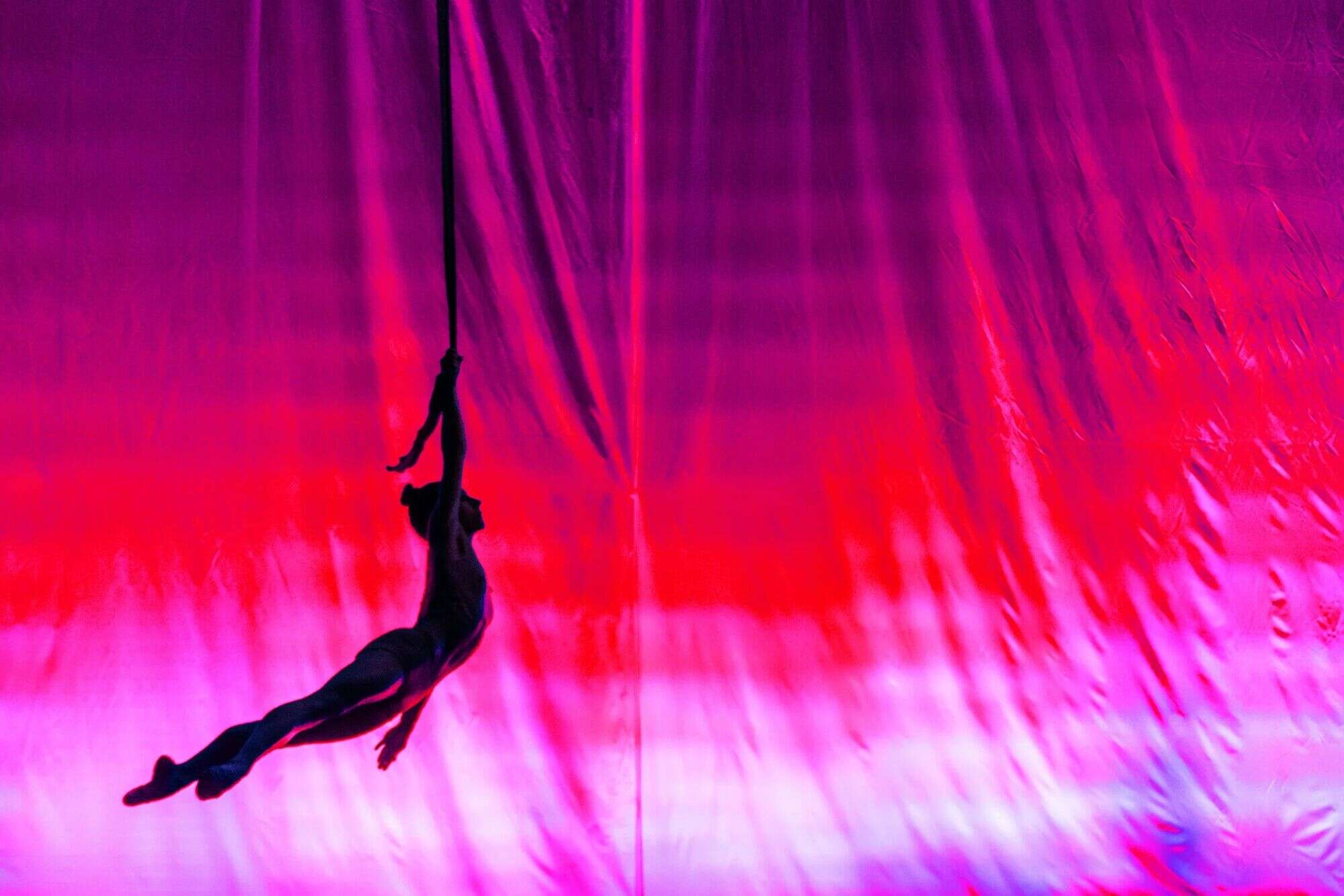 Magenta-red aerial silhouette