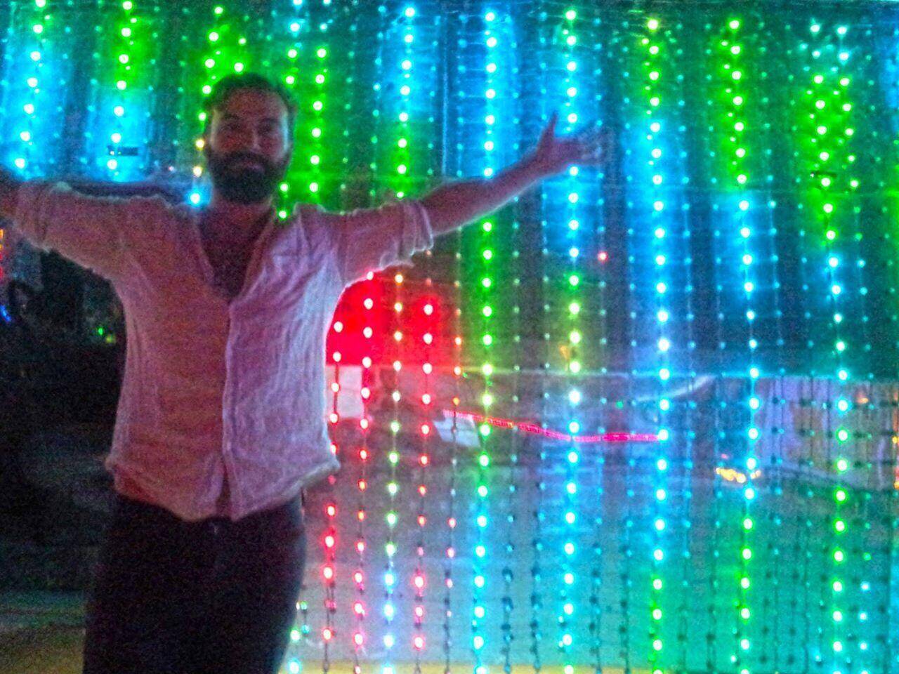 Brendan in front of the LED pixel wall