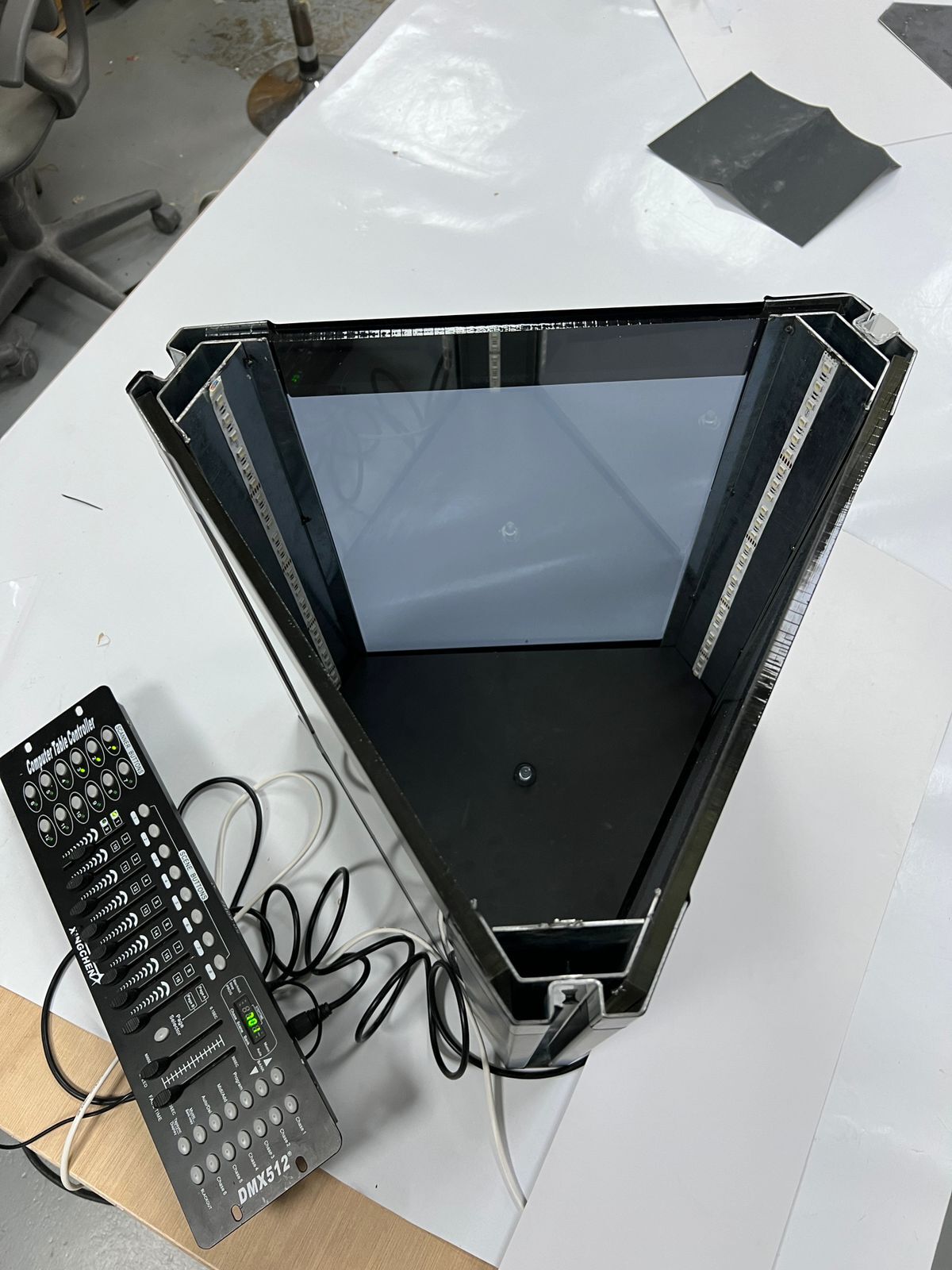 Fabricated triangular enclosure with DMX512 lighting controller